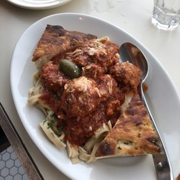 Campione signature dishes Spaghetti with Meatballs, Rigatoni with Sausage, Seasonal Salads, House-made Focaccia